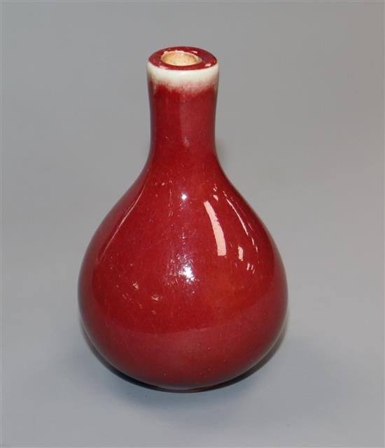 A Chinese miniature sang-de-boeuf bottle vase